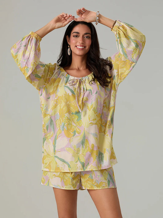 Elegant Floral Ensemble Stylish Long Sleeve Blouse with Tie-up Detail and Elastic Waist Shorts for a Chic Summer Look