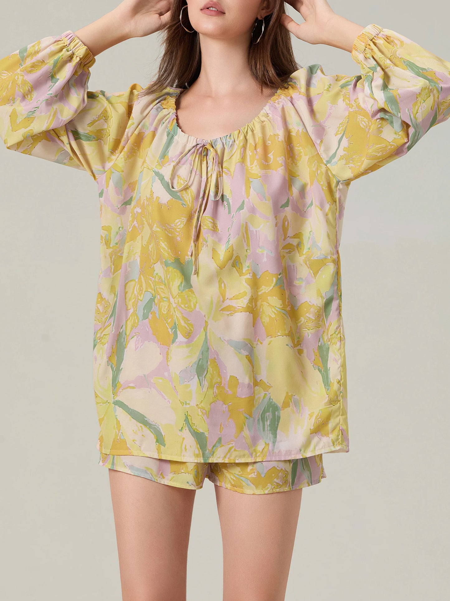 Elegant Floral Ensemble Stylish Long Sleeve Blouse with Tie-up Detail and Elastic Waist Shorts for a Chic Summer Look