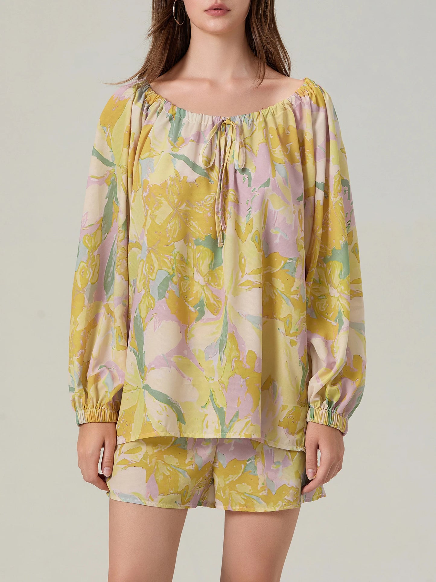 Elegant Floral Ensemble Stylish Long Sleeve Blouse with Tie-up Detail and Elastic Waist Shorts for a Chic Summer Look